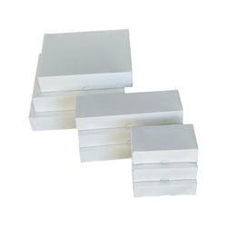 Business card boxes in various sizes for storage.