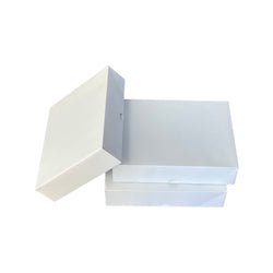 Business card boxes with a clean, white design.